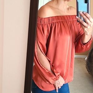 Express satin off shoulder top.